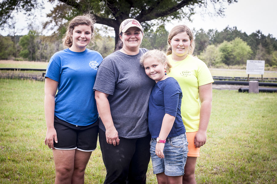 Farm girls: Eddie Conner's daughter and granddaughters help out with chores at Conner's A-Maize-Ing Acres